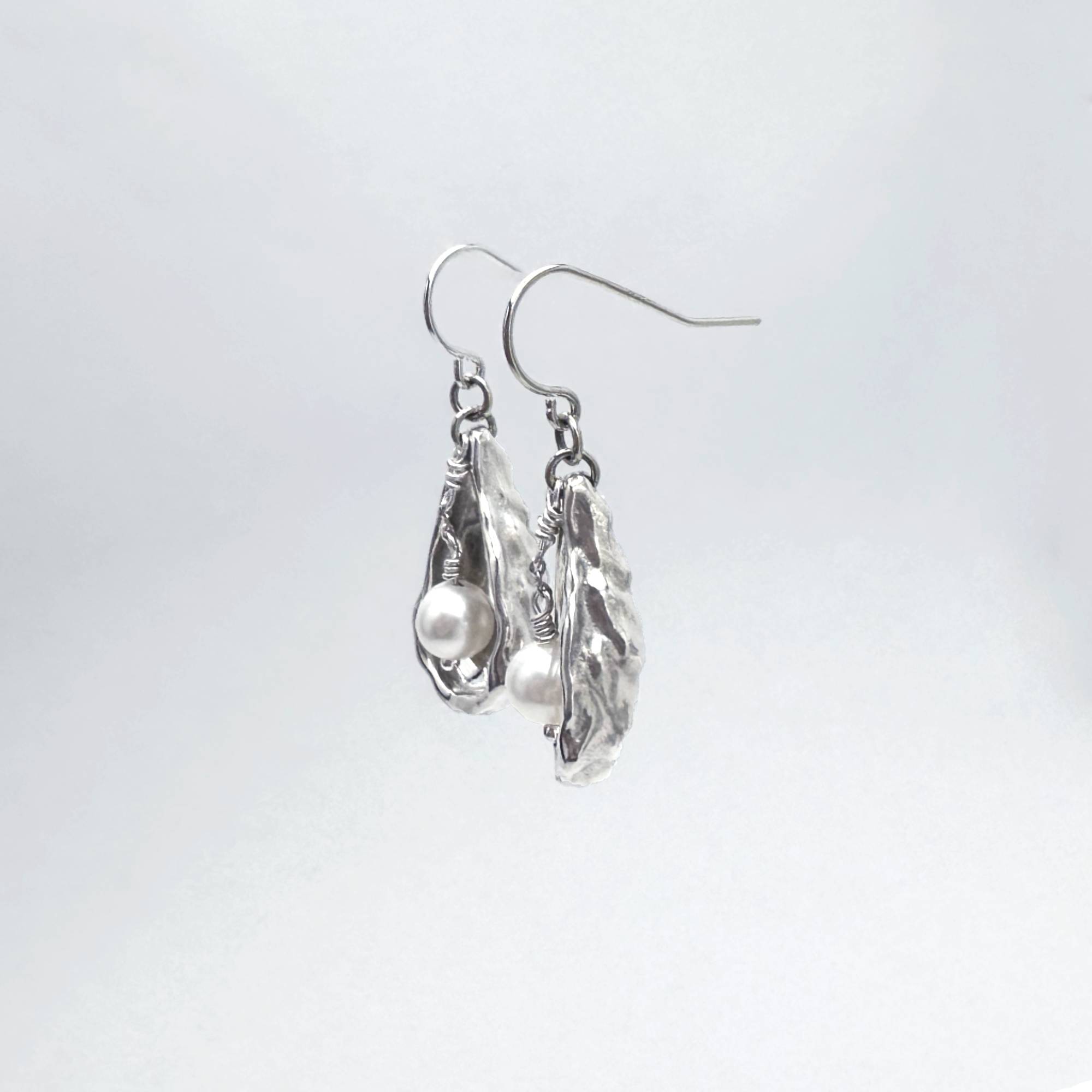 Oyster Earrings with Large Pearls